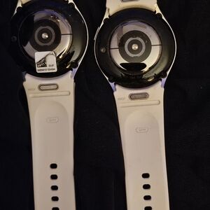 White Smartwatch with Circular Face and Sensor Array